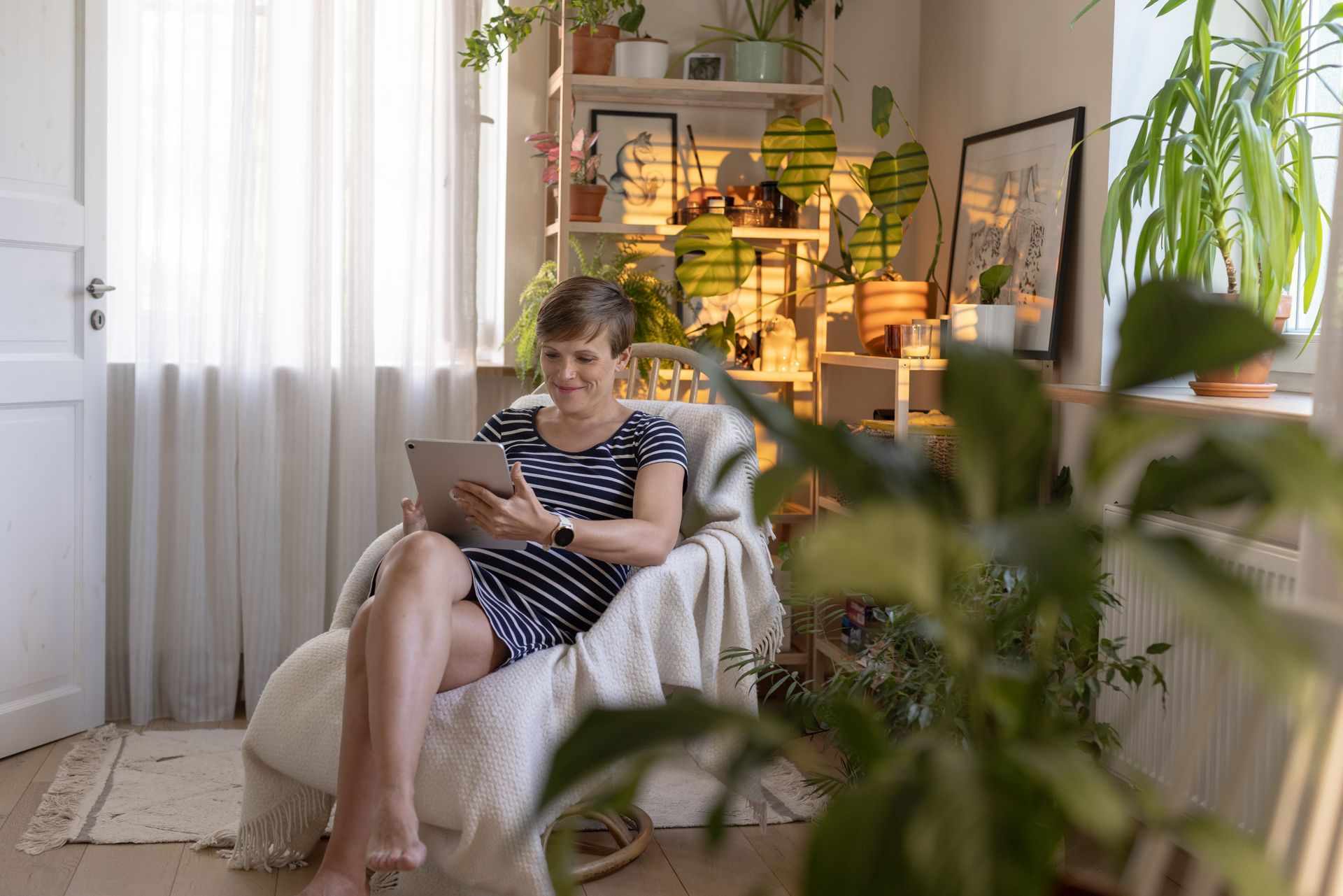 658823 Woman Tracking Health on Tablet Web Version 1920px
